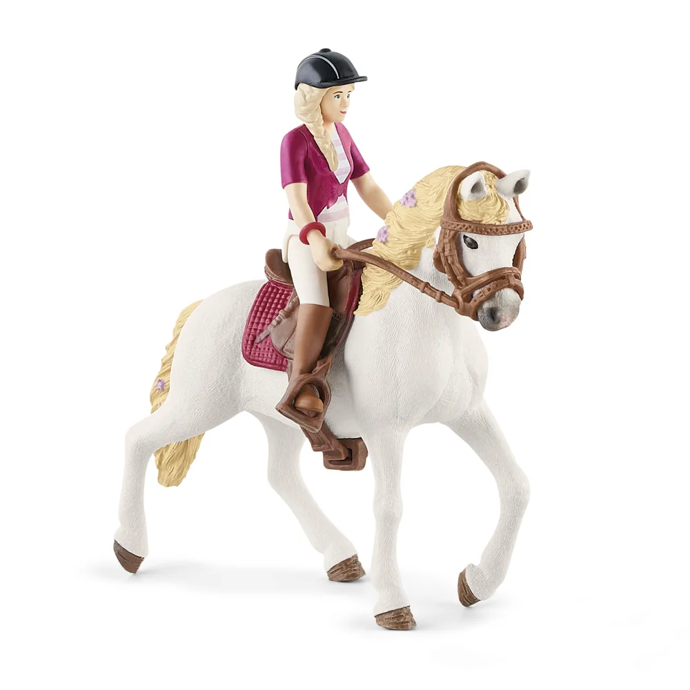 Blondýna Sofia s pohyblivými kouby na koni