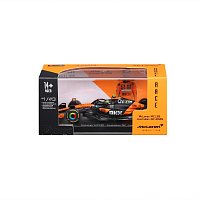 Bburago - RACE F1 v dekorativním boxu, McLaren F1 MCL39 (2025) #4 Lando Norris, 1:43