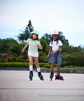 Inline brusle GO SKATES se svítícím předním kolečkem vel. 34-37, černo-růžové