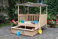 Garden sitting area with retractable sandbox