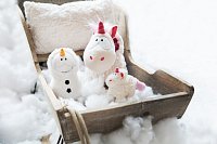 NICI plyš Jednorožec Theodor ve sněhové kombinéze 13cm, GREEN