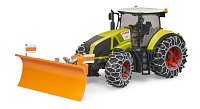 Farmer - Claas Axion 950 se sněhovými řetězy a radlicí