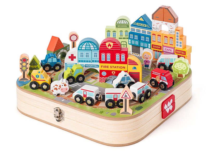 Suitcase with city blocks and train