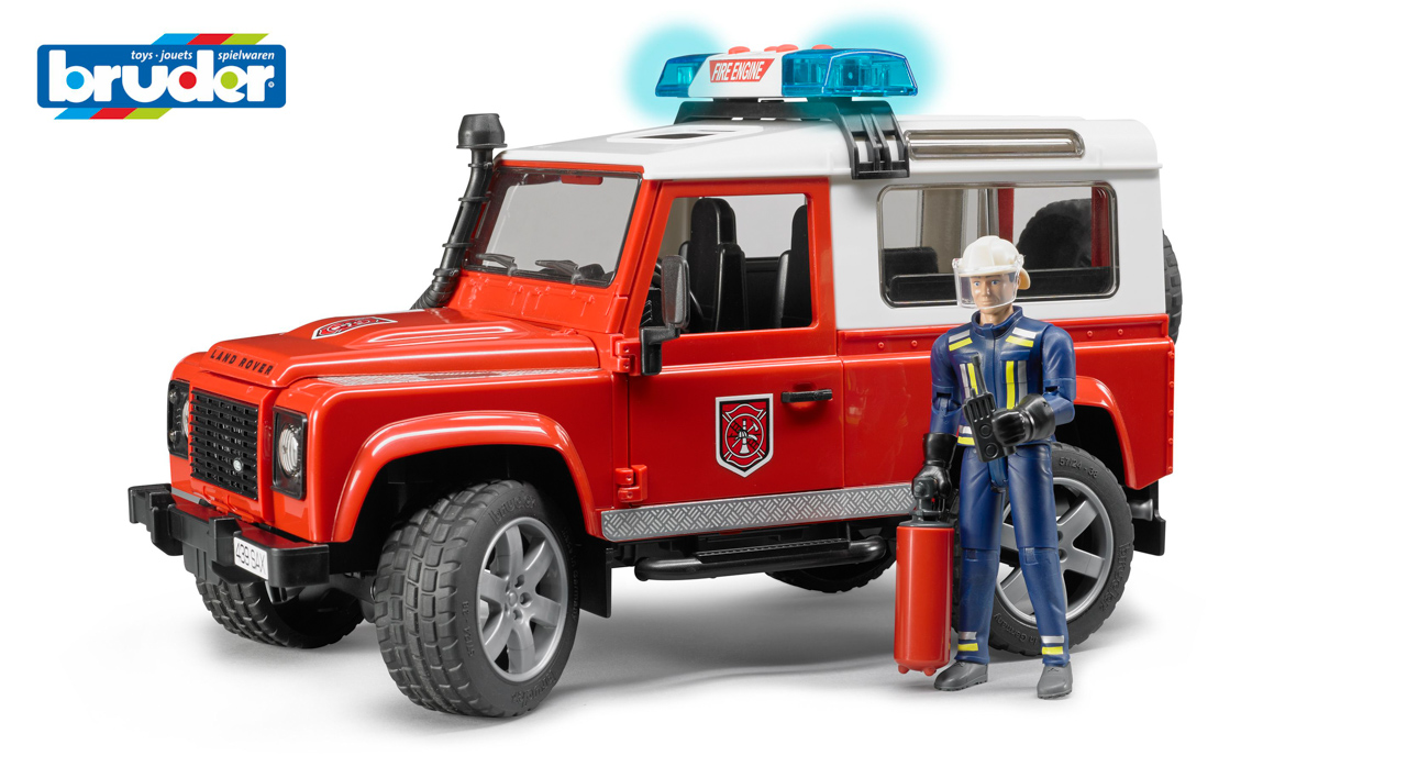 Užitkové vozy - hasičské auto Land Rover s hasičem
